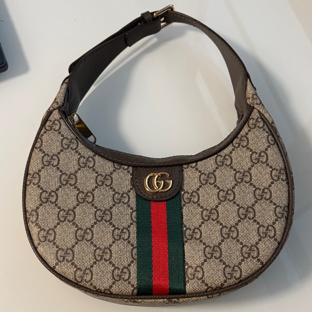 GG Monogram fashion mini bag.